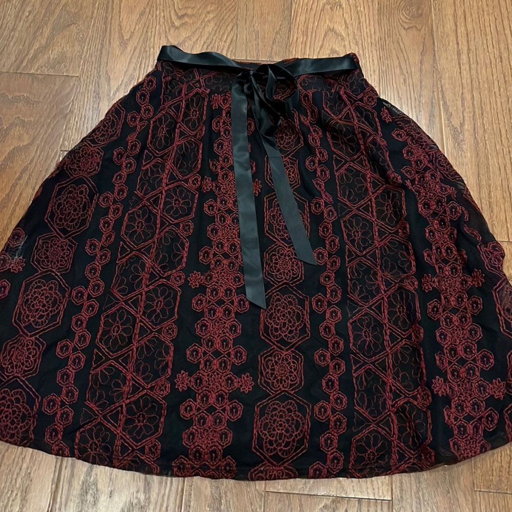 Red and black patterned midi skirt